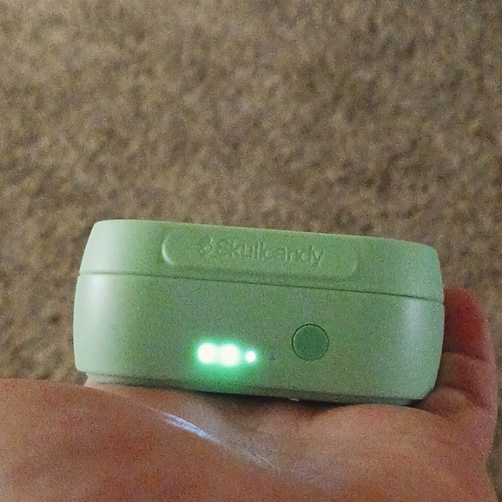 Mint green skull candy airpods